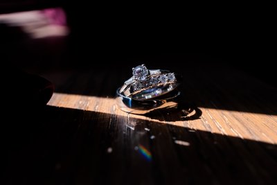 close up details of wedding rings in the sunlight