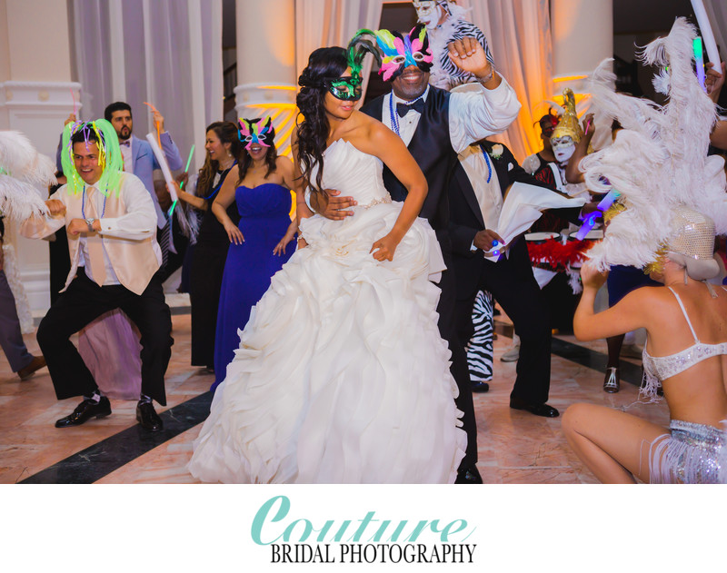 WEDDING RECEPTION: BRIDE AND GROOM DANCING