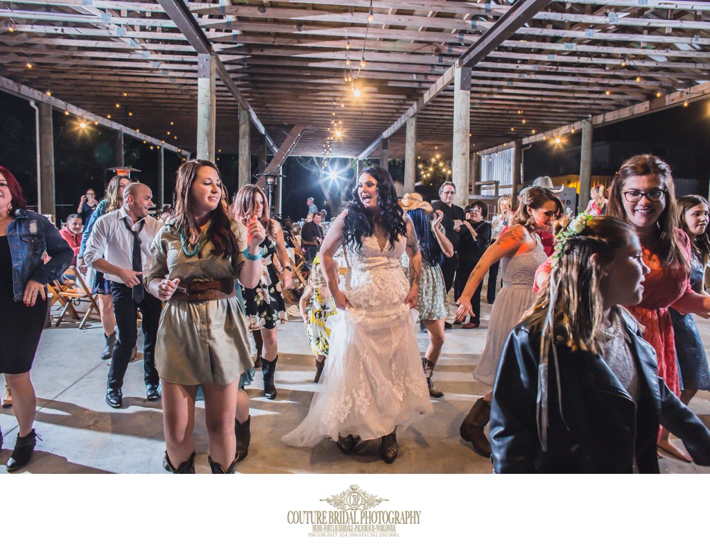 BARN WEDDING RECEPTION: DANCING BRIDE