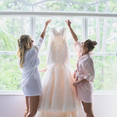 BRIDES WEDDING DRESS AND BALL GOWN