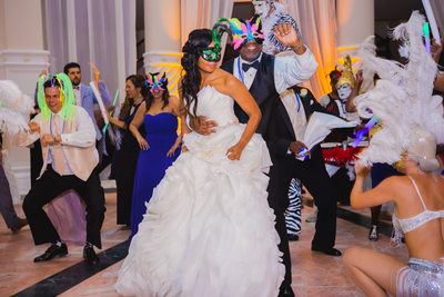 WEDDING RECEPTION: BRIDE AND GROOM DANCING