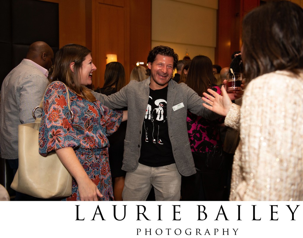 Guests share a laugh at Beverly Wilshire corporate event