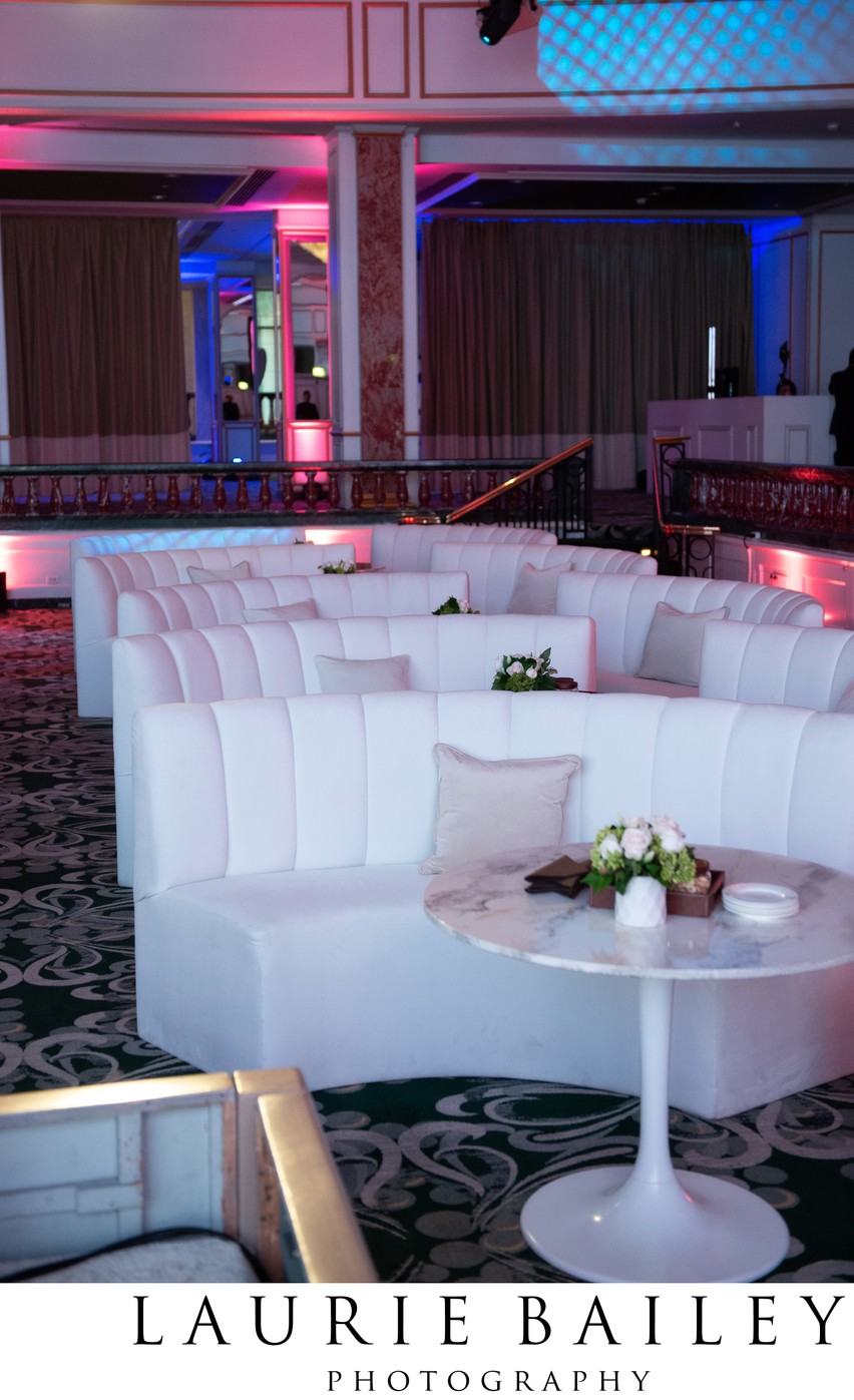 A gold leading line draws the eye through the ballroom setup