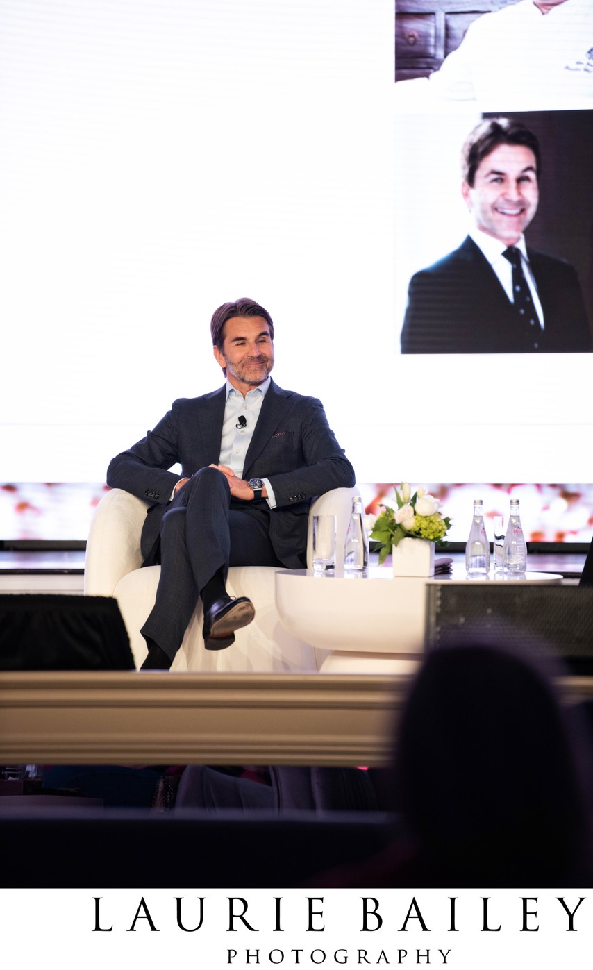 A speaker moment becomes the proof-of-room shot at an LA event