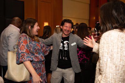 Guests share a laugh at Beverly Wilshire corporate event
