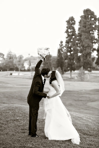 Newlywed Kisses on the Golf Course