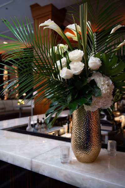 White florals and greenery add polish to a Beverly Hills corporate event