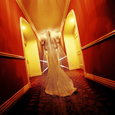 ​Bride in hallway at the Mansion on Turtle Creek.