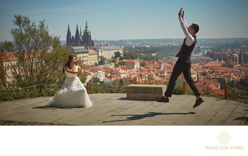 Cos playing bride & groom overlooking Prague