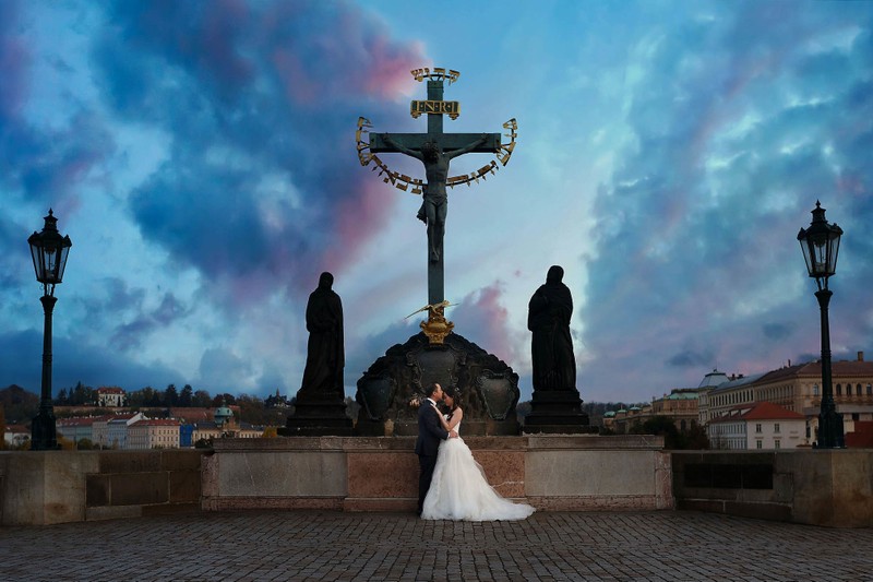 Crucifix and Calvary bride & groom at sunrise