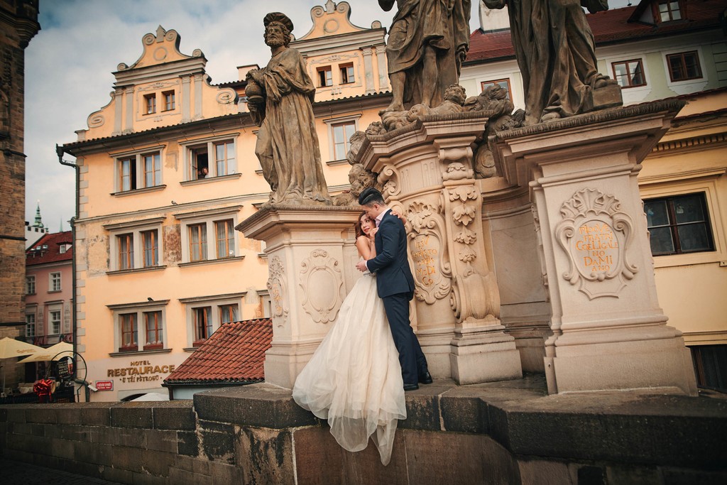 Cuddling with his bride