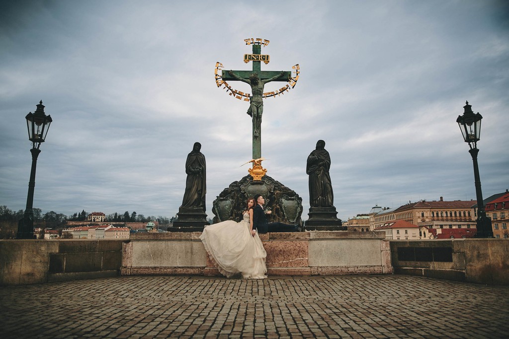 Singapore Bride & Groom Reclining on Charles Bridge