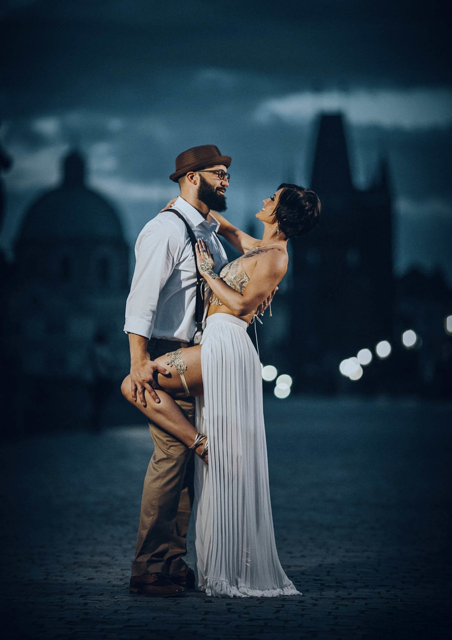 Sexy Americans on Charles Bridge in Prague at Night