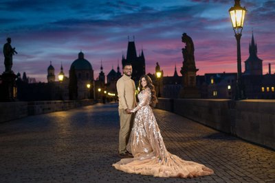 Lovers atop Charles Bridge at Sunrise