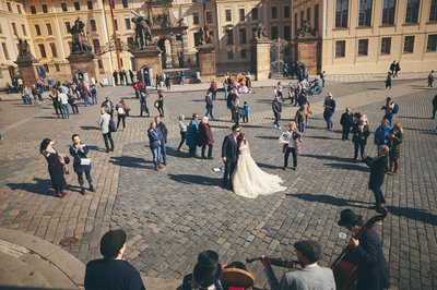 posing for fans at Prague Castle