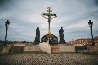 Singapore Bride & Groom Reclining on Charles Bridge