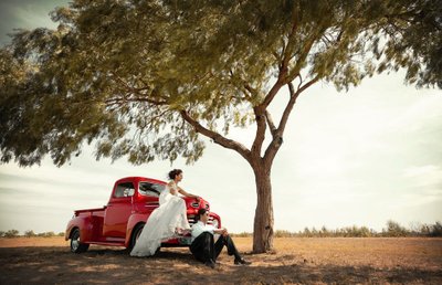 Wedding Couple with a Classic Red Ford Truck 