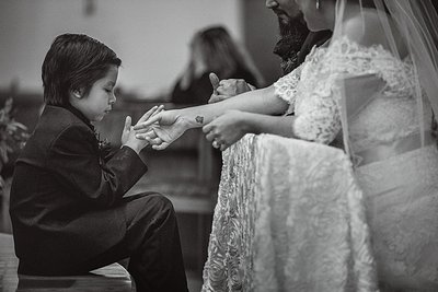 Candid photography with bride and son