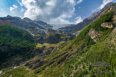 Mattertal Valley in the Swiss Alps. The Hobärggletscher glacier visible at the head of the valley.
