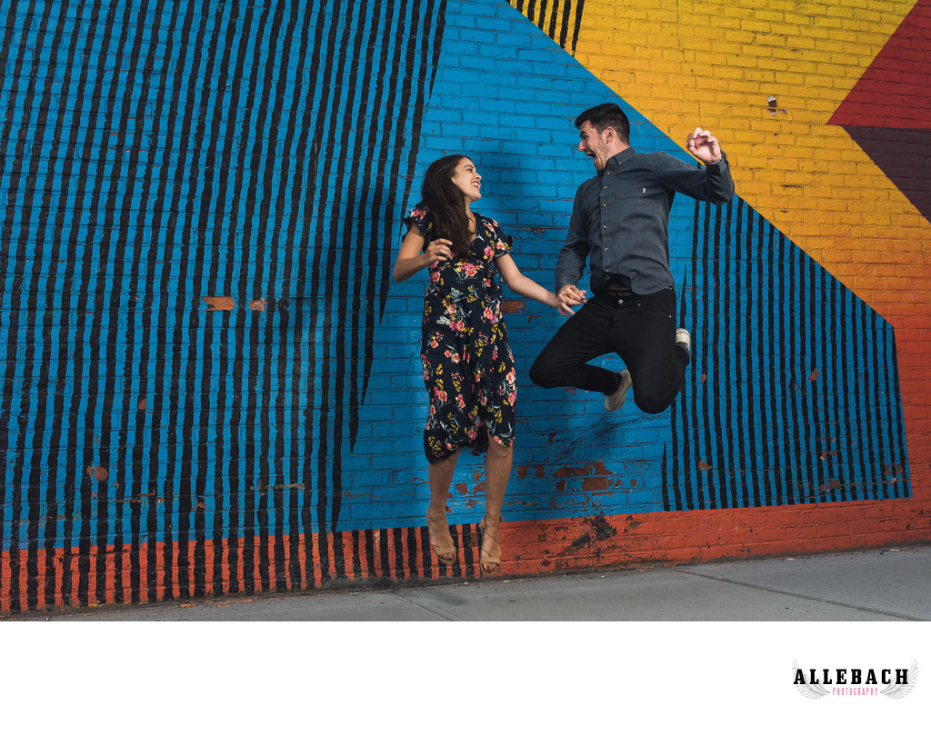 Couple Jumping in DUMBO Engagement photo Session