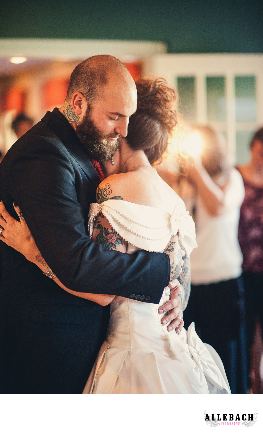 Tattooed Bride and Groom Dancing at Wedding