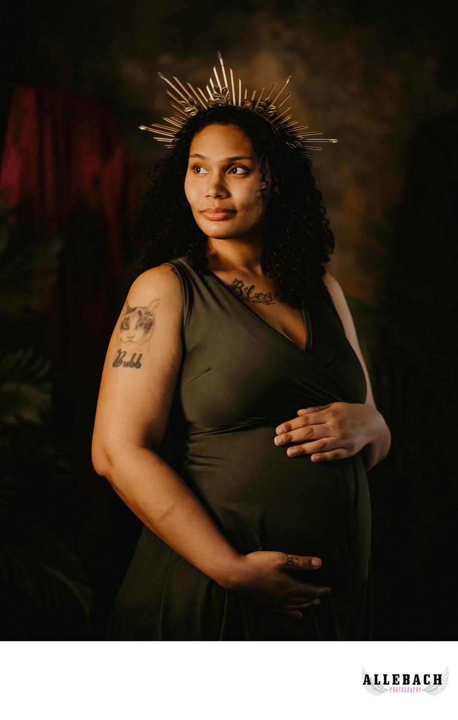 New Mom Wearing a Crown in Maternity Photosession