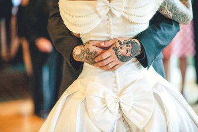 Tattooed Couple Dancing at their Wedding