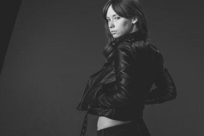 Hattie Watson Wearing Leather Coat