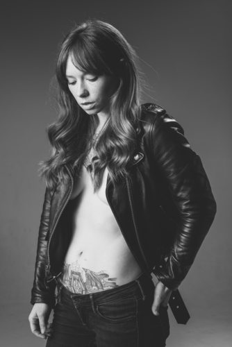 Hattie Watson in Leather Jacket and Jeans