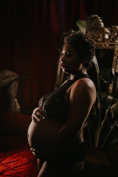 Beautiful Maternity Photos on a Red Background